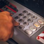 Person reviewing annuity contract withdrawal rules and surrender schedule